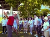 The coach going through the basics of the golf swing